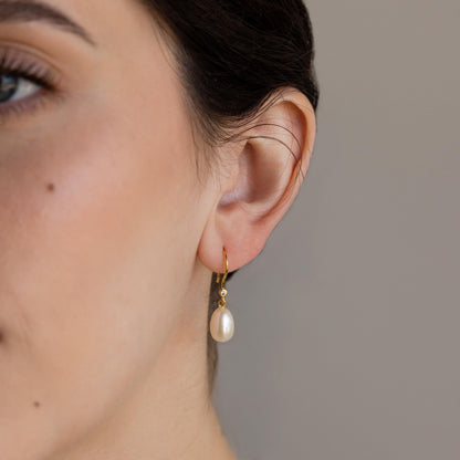 Pendientes colgantes de perlas y diamantes