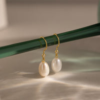 Pendientes colgantes de perlas y diamantes