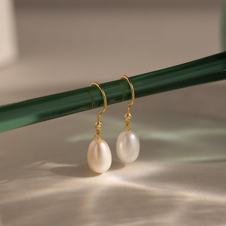 Pendientes colgantes de perlas y diamantes
