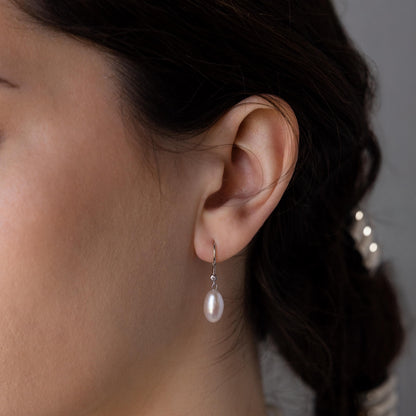 Pendientes colgantes de perlas y diamantes