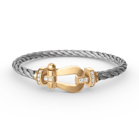 [LUXE]FORCE PULSERA DE MEDIO DIAMANTE CON HERRADURA GRANDE EN ORO