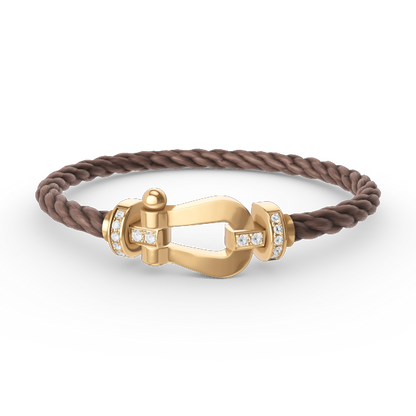 [LUXE]FORCE PULSERA DE MEDIO DIAMANTE CON HERRADURA GRANDE EN ORO