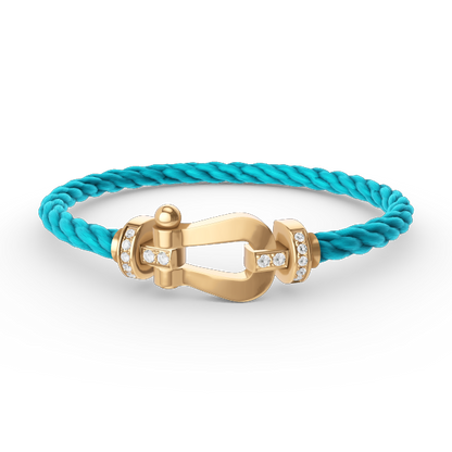 [LUXE]FORCE PULSERA DE MEDIO DIAMANTE CON HERRADURA GRANDE EN ORO