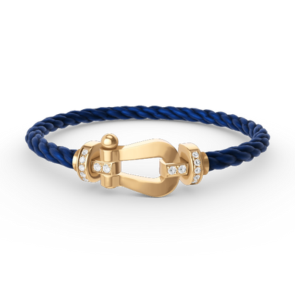 [LUXE]FORCE PULSERA DE MEDIO DIAMANTE CON HERRADURA GRANDE EN ORO