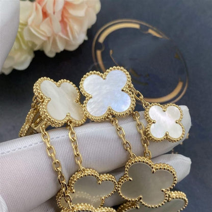 [LUXE]PENDIENTES TRÉBOL BLANCO 4 MOTIVOS ORO