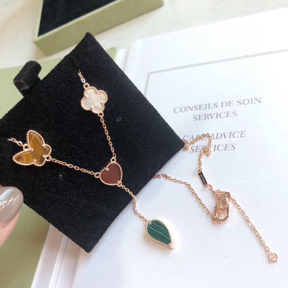 [LUXE] COLLAR DE ORO ROSA CON 4 MOTIVOS LUCKY SPRING